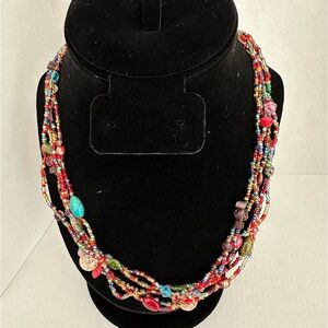 Colorful glad and plastic beaded 5 strand seed bead necklace